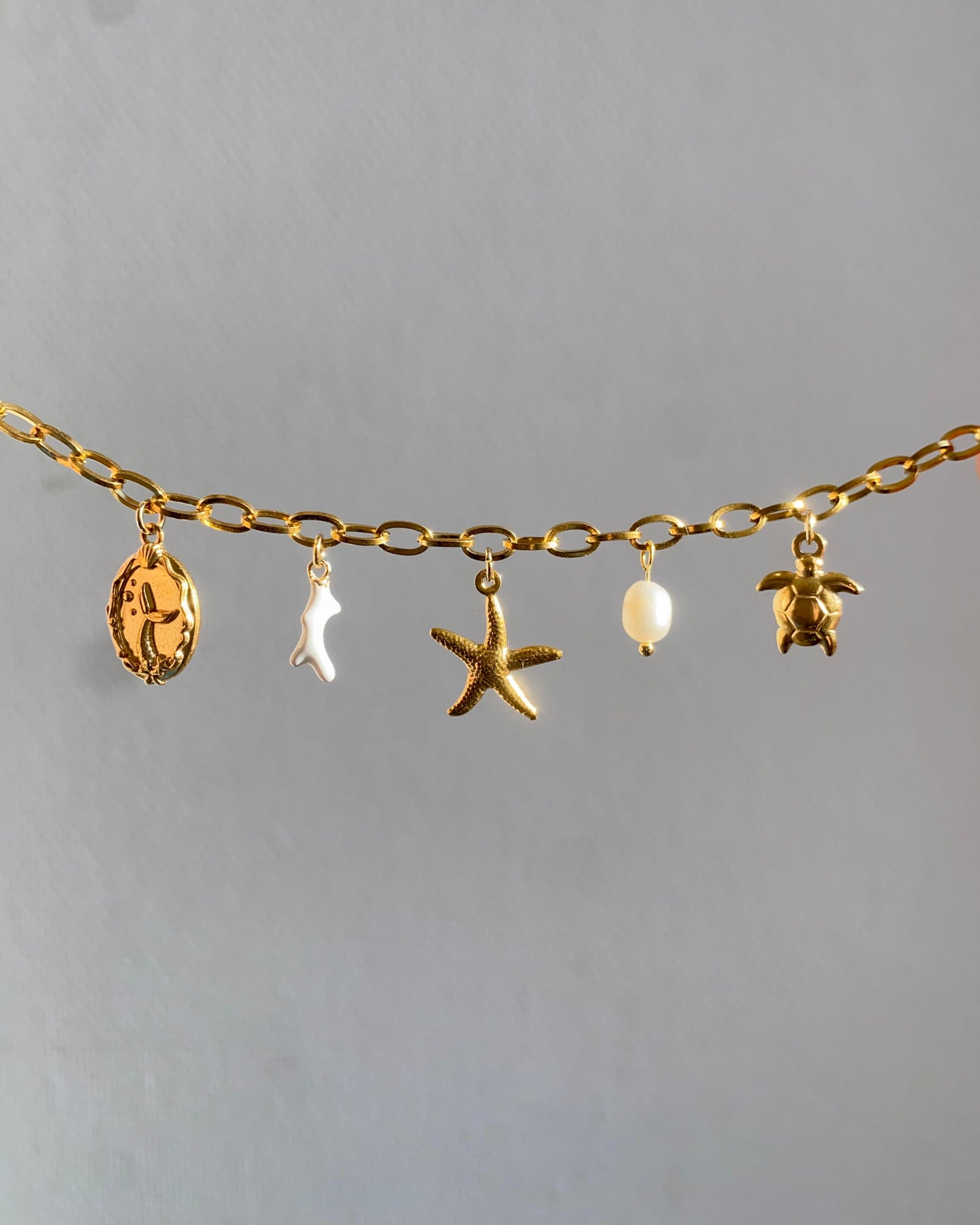 Customizable charm bracelet - Ocean treasure in gold